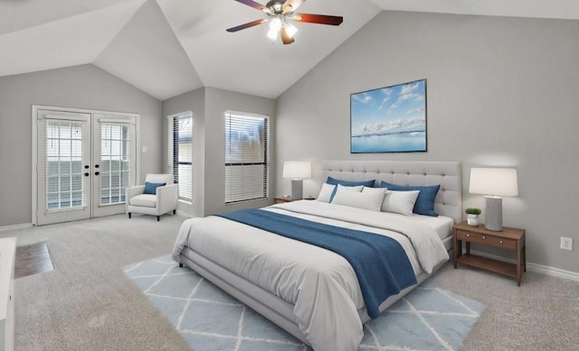 carpeted bedroom with access to outside, french doors, ceiling fan, and vaulted ceiling