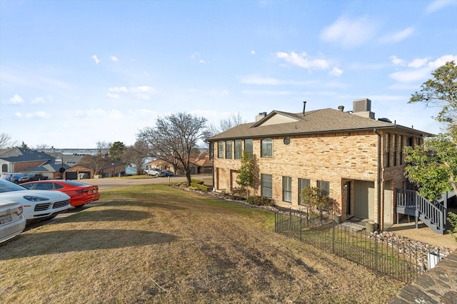 view of property exterior with a yard