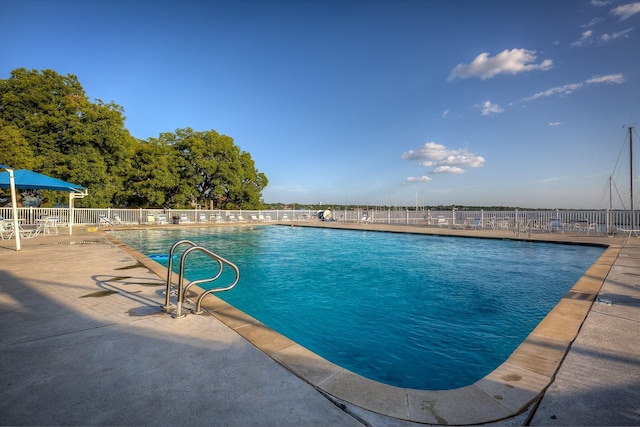 view of pool with a patio area