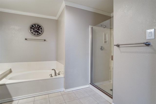 bathroom featuring tile patterned flooring, crown molding, and shower with separate bathtub