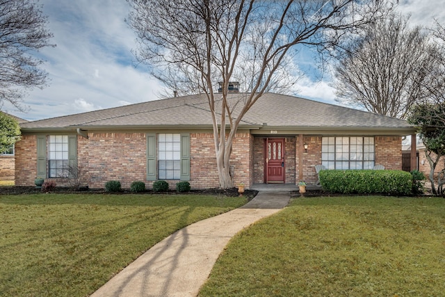 single story home with a front lawn