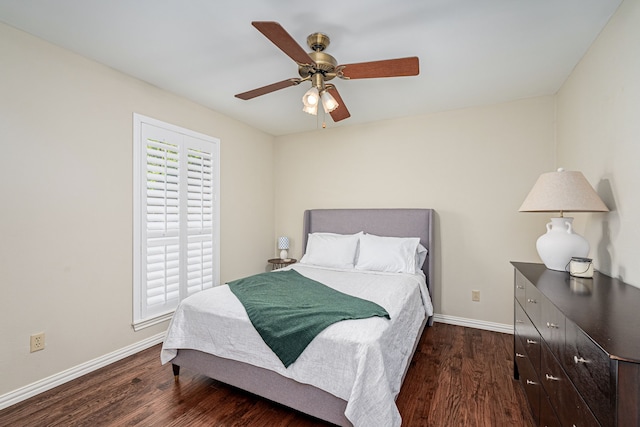 bedroom with dark wood-type flooring and ceiling fan