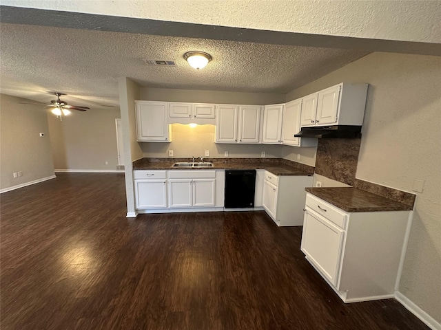 kitchen with dark hardwood / wood-style flooring, sink, and white cabinets