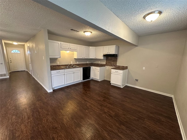 kitchen featuring sink, dark wood-type flooring, black dishwasher, and white cabinets