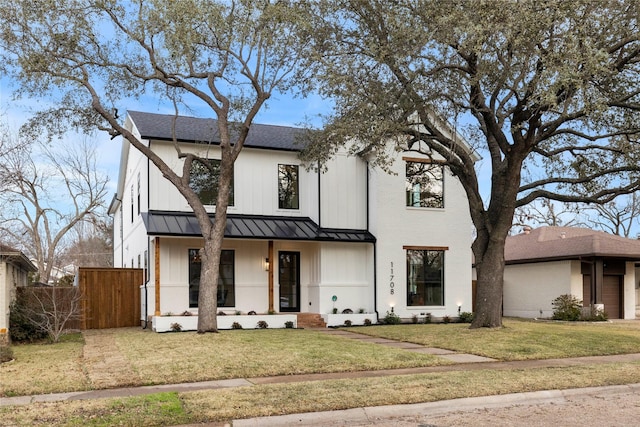 view of front of property with a front lawn