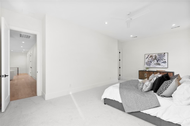 carpeted bedroom with ceiling fan