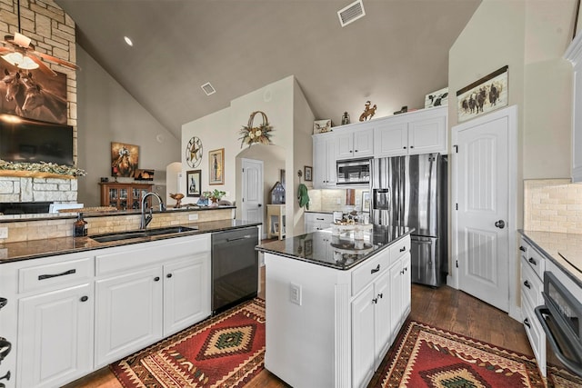 kitchen featuring sink, stainless steel appliances, and white cabinets