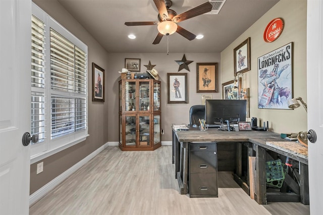 office space with ceiling fan and light wood-type flooring