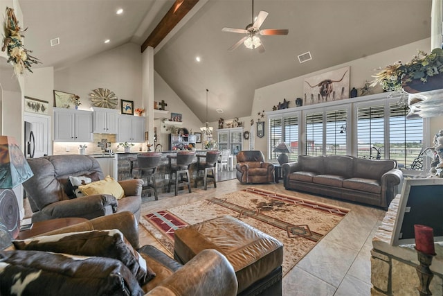 living room with ceiling fan, beam ceiling, and high vaulted ceiling