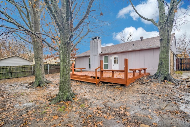 rear view of property with a deck