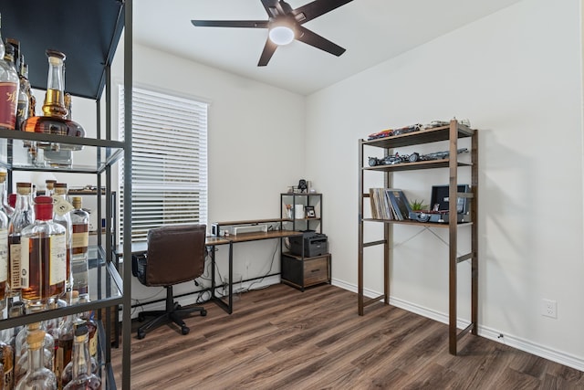 office space featuring dark hardwood / wood-style floors and ceiling fan