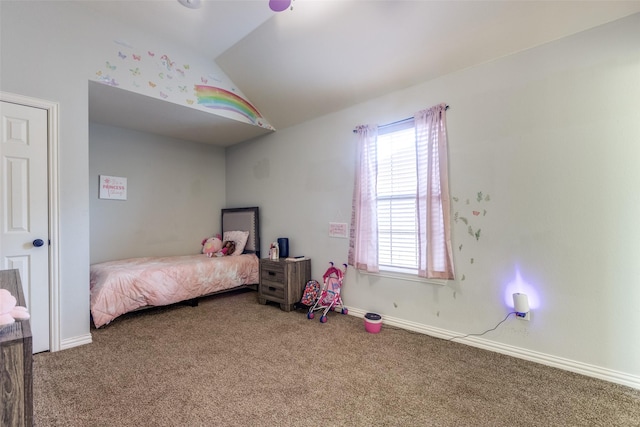 carpeted bedroom with vaulted ceiling