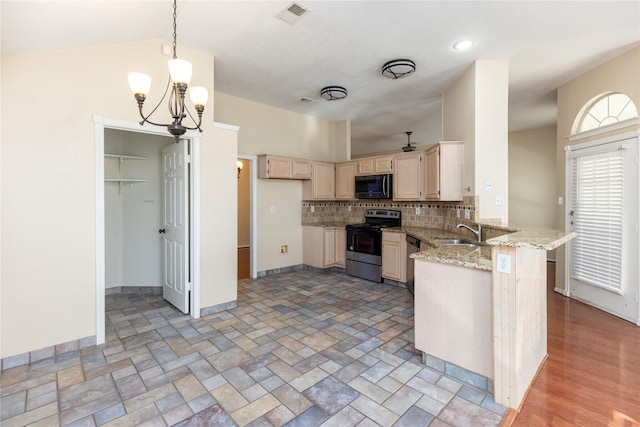 kitchen with visible vents, a peninsula, stainless steel electric range, a sink, and tasteful backsplash