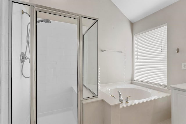 bathroom with separate shower and tub