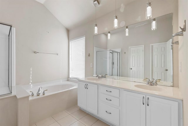 bathroom with vanity, vaulted ceiling, tile patterned floors, and shower with separate bathtub