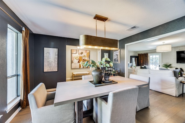 dining room featuring hardwood / wood-style flooring