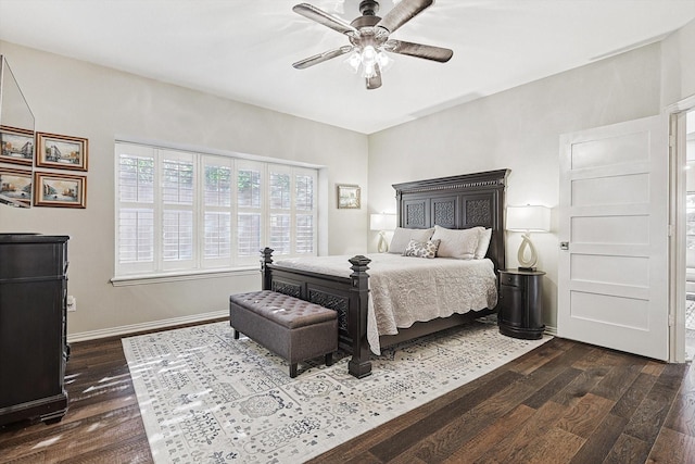 bedroom featuring dark wood-type flooring and ceiling fan