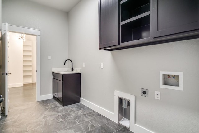 laundry area with washer hookup, sink, cabinets, and hookup for an electric dryer