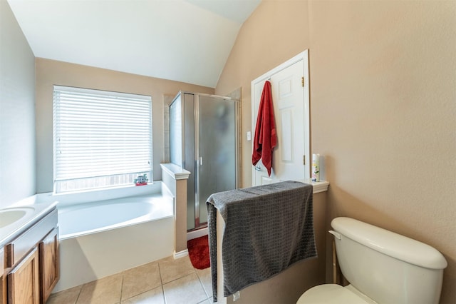 bathroom with a garden tub, toilet, a stall shower, tile patterned flooring, and lofted ceiling