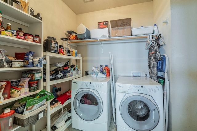 laundry room featuring washer and dryer and laundry area