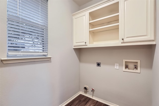 laundry area with cabinets, washer hookup, dark hardwood / wood-style flooring, hookup for a gas dryer, and hookup for an electric dryer