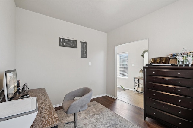 office with hardwood / wood-style flooring