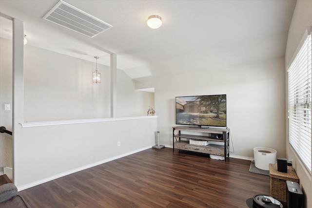 living room featuring dark wood-type flooring