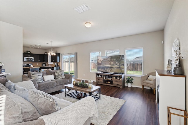 living room with dark wood-type flooring