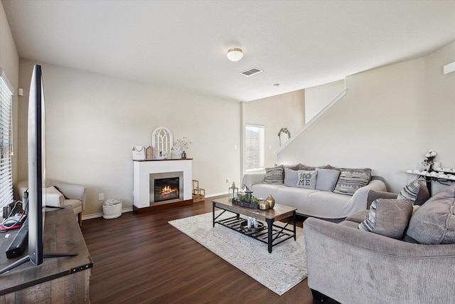 living room with dark wood-type flooring