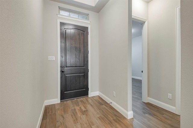 entryway with light hardwood / wood-style flooring