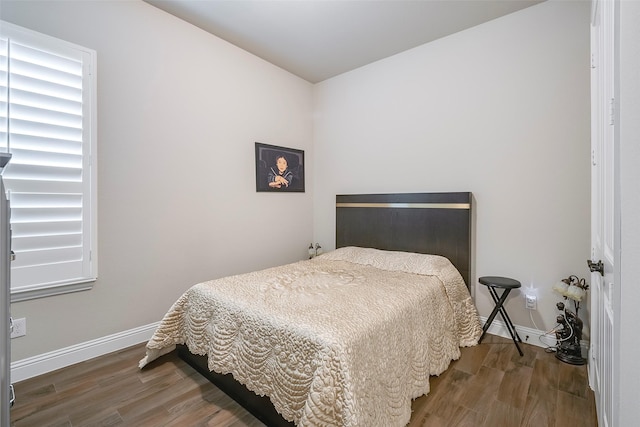 bedroom featuring hardwood / wood-style floors