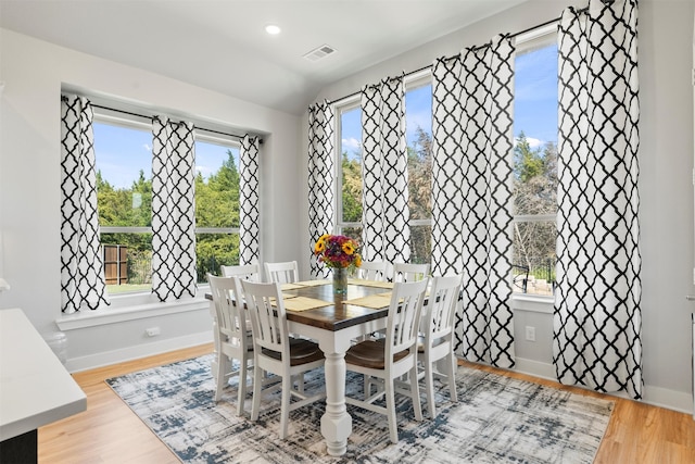 dining room featuring light hardwood / wood-style floors