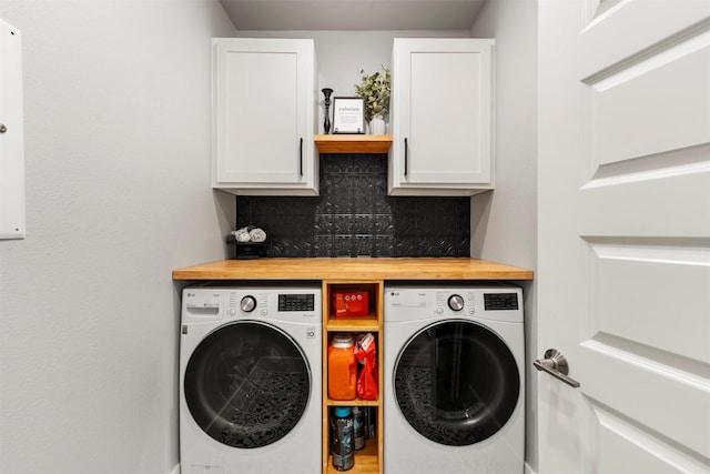 laundry area with cabinets and washer and dryer