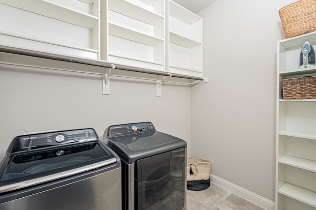 laundry area with washer and clothes dryer