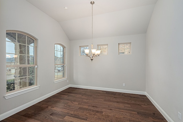 unfurnished dining area featuring vaulted ceiling, dark wood-type flooring, and a chandelier