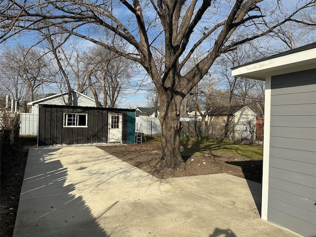 view of patio with a storage unit