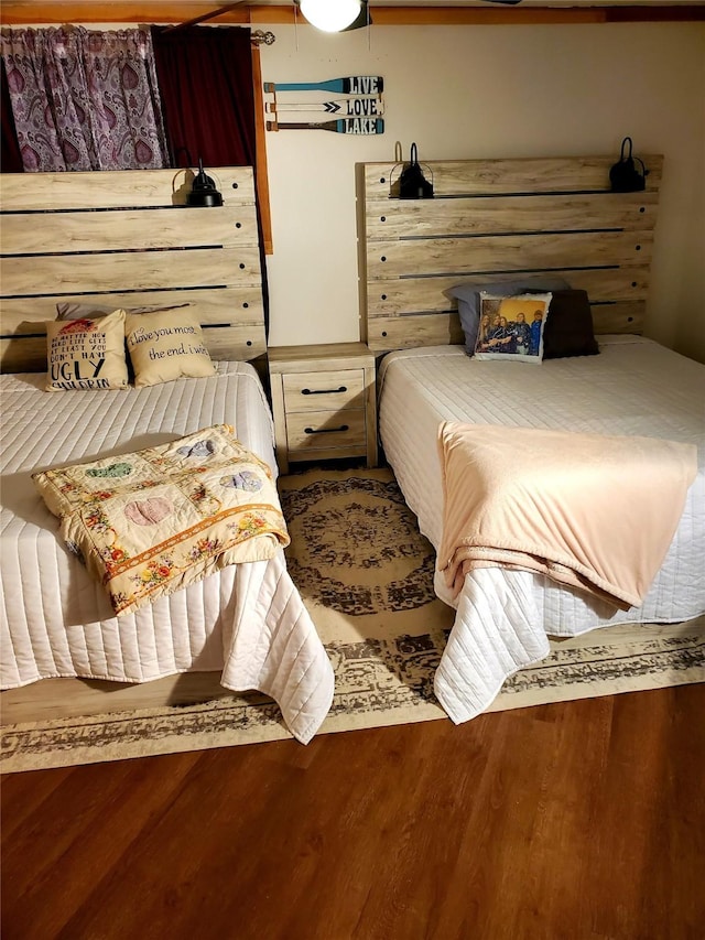 bedroom featuring hardwood / wood-style flooring