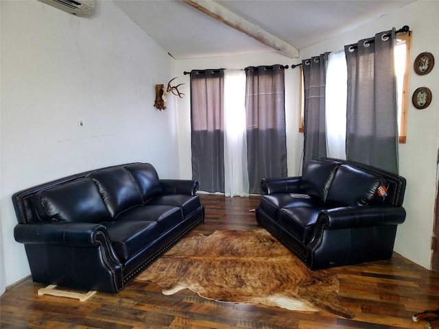 living room with dark hardwood / wood-style flooring, a wall mounted AC, and beam ceiling