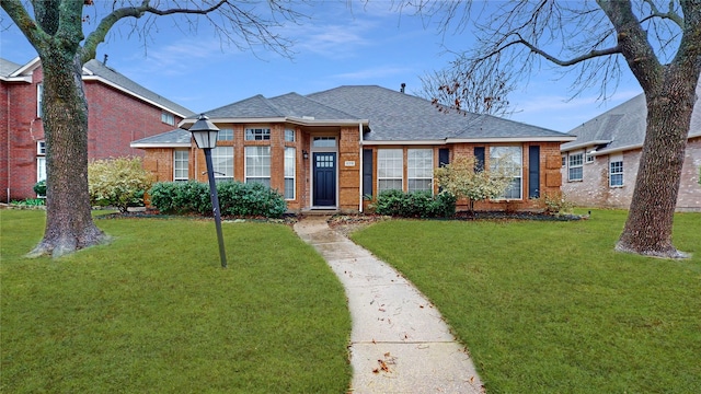 view of front of property with a front lawn