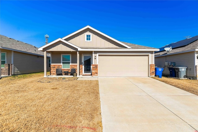 craftsman-style home with a porch and a garage