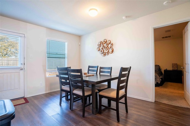 dining room featuring dark hardwood / wood-style floors