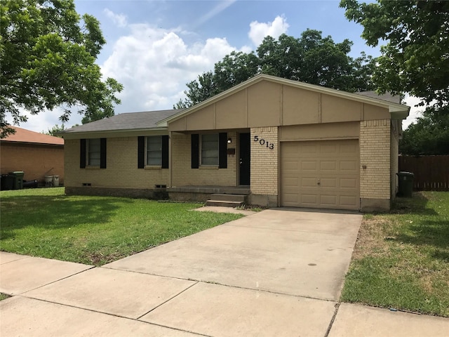 ranch-style home featuring a garage and a front lawn