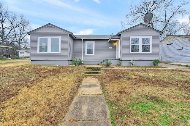 view of front of house with a front lawn