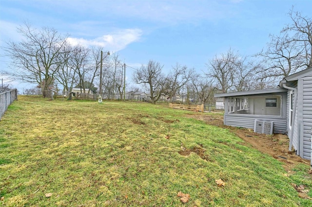 view of yard featuring a sunroom