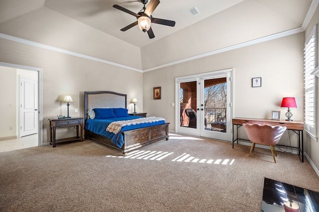 carpeted bedroom featuring vaulted ceiling, multiple windows, and access to outside