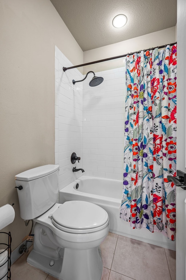 bathroom featuring shower / tub combo with curtain, toilet, tile patterned flooring, and a textured ceiling