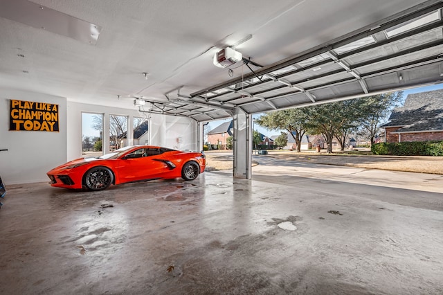 garage featuring a garage door opener