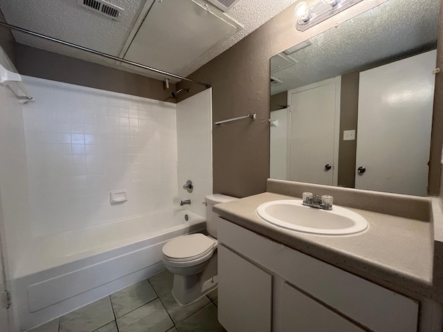 full bathroom with bathing tub / shower combination, vanity, a textured ceiling, and toilet