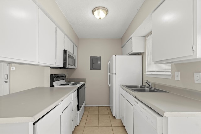 kitchen with white cabinetry, white appliances, sink, and a textured ceiling