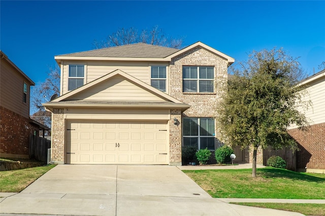 view of front of home with a garage and a front lawn